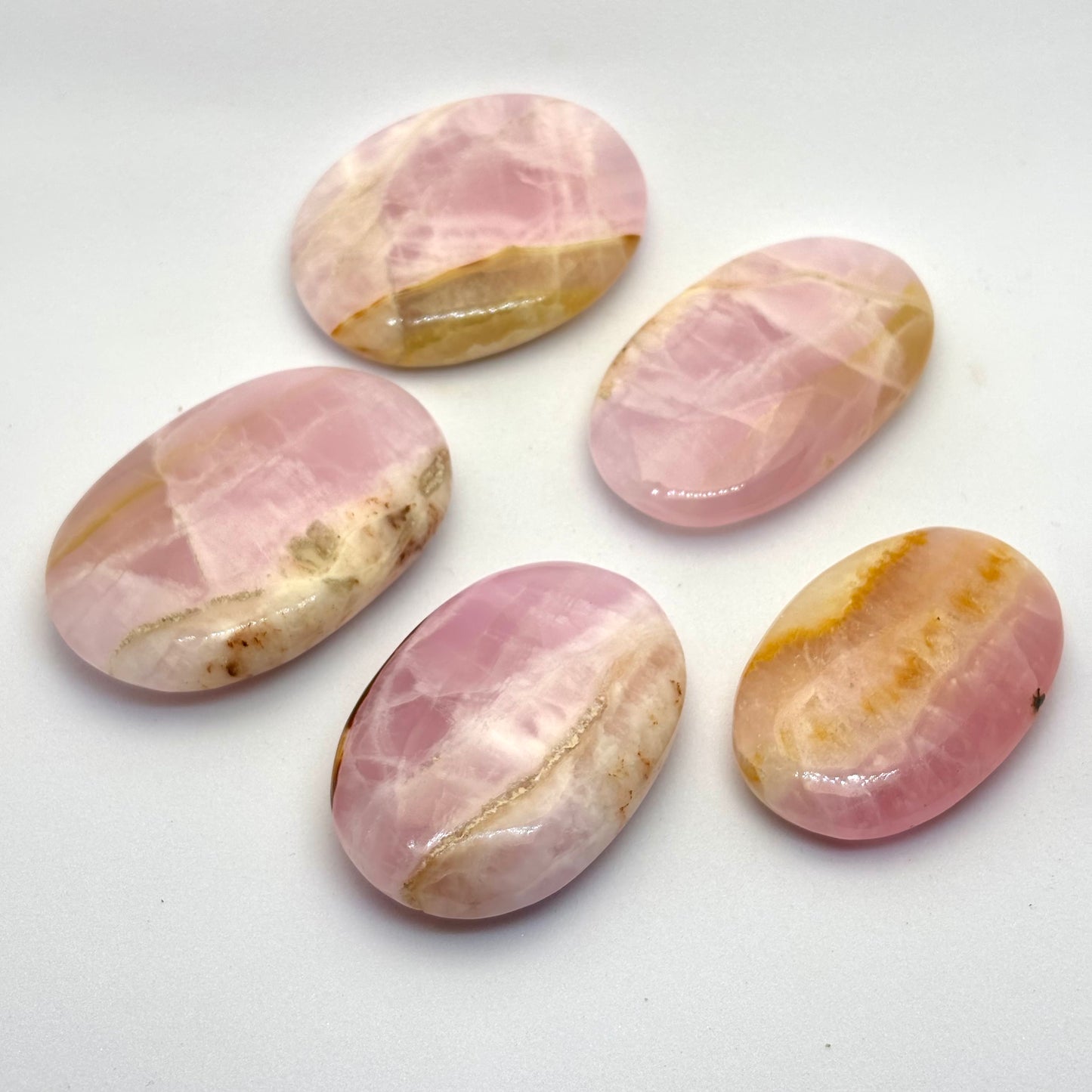 Pink Aragonit palmstone 4,5 - 5 cm Pink Aragonit palmstone 4,5 - 5 cm