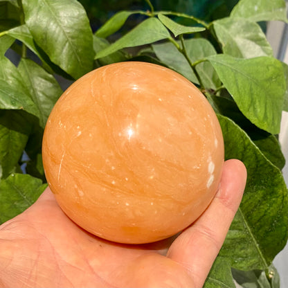 Orange kalcitboll - 9 cm